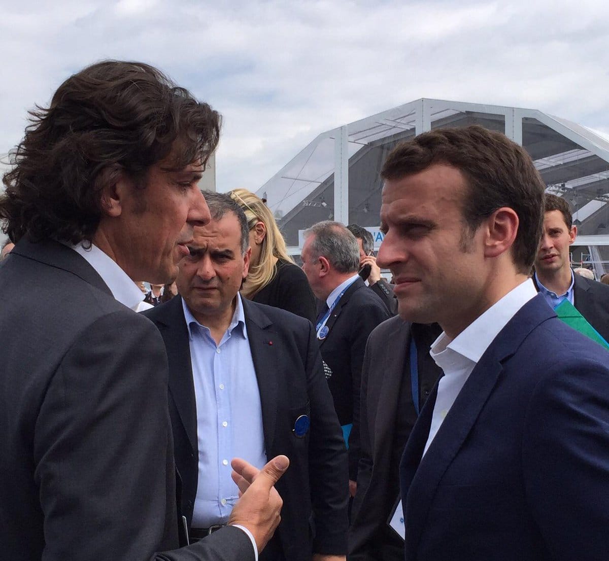Chopard speaking with French Economy Minister Emmanuel Macron in 2015. Photo via Twitter.
