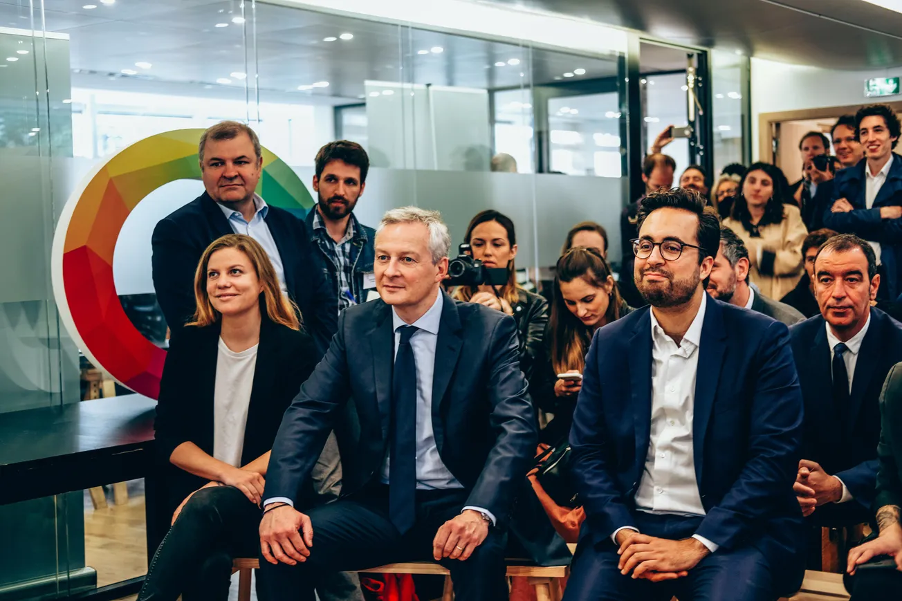 French Economy Minister Bruno Le Maire (center) and former Digital Minister Mounir Mahjoubi (right)